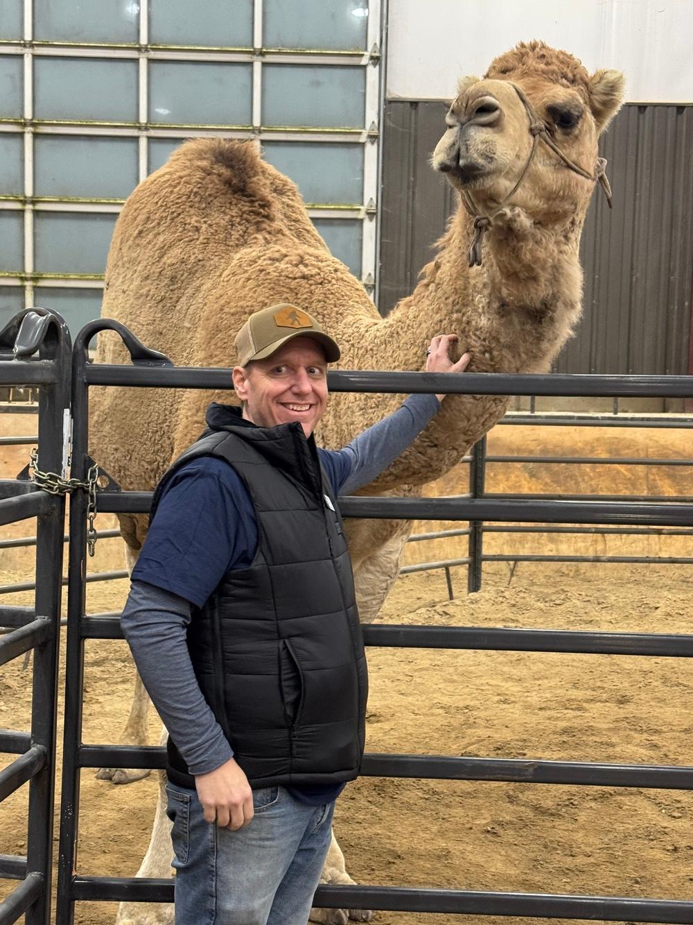 Dave poses with a camel at Reindeer Express.
