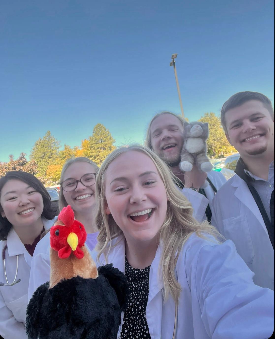 Erika, Tacey, Madi, Xander, and Collin are all smiles after completing Diagnostic Challenge 1.